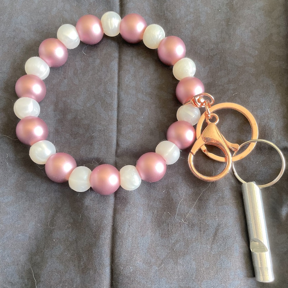 Silicone and aluminum bead key ring/bracelet with safety whistle